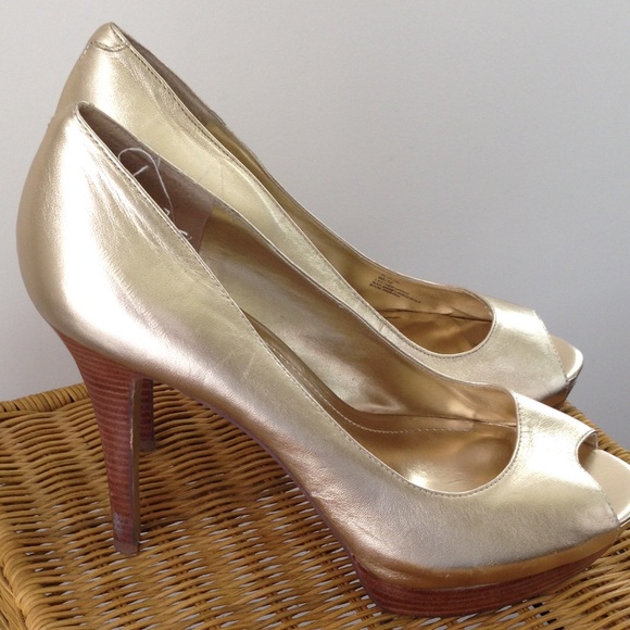 Gold open toe pumps
