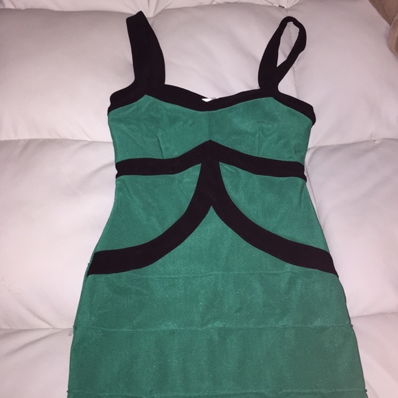Short green outlined with black dress