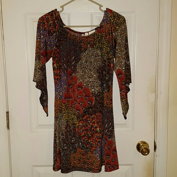 Multi-colored, multi-printed tunic top.