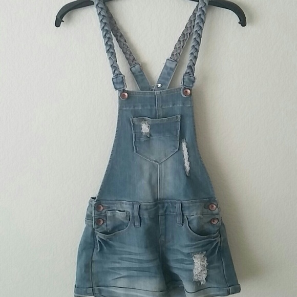 Ripped denim overalls