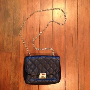 Black quilted cross body bag