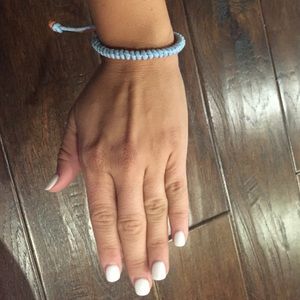 Blue and red string bracelet