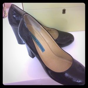 Black patent leather pumps