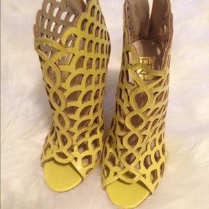 Yellow sandal heels.