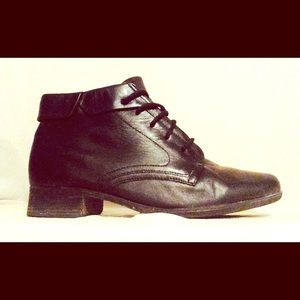 Black Leather heel boots.