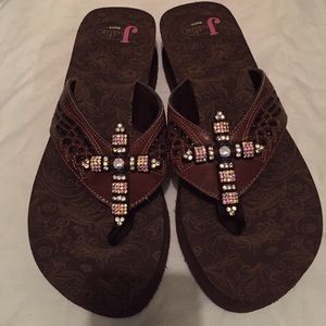 Brown bling with cross flip flops
