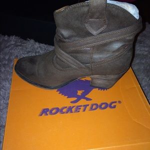 Brown ankle cowboy boots.