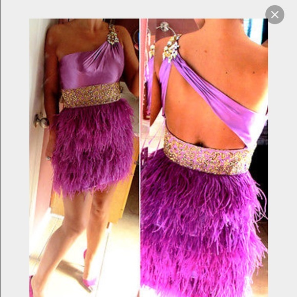 Homecoming dress with purple feathers on skirt.