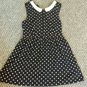 Black dress with white polka dots