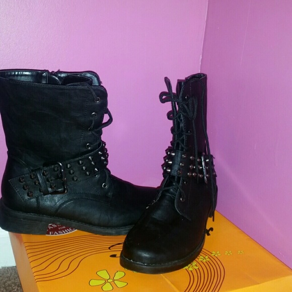 Black leather boots with spikes