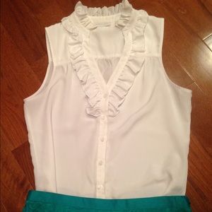 White sleeveless blouse