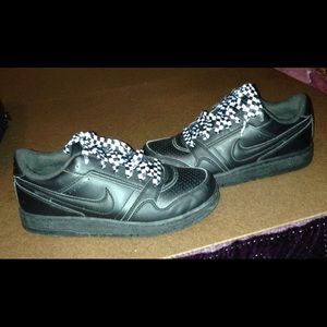 Black low top Nike's