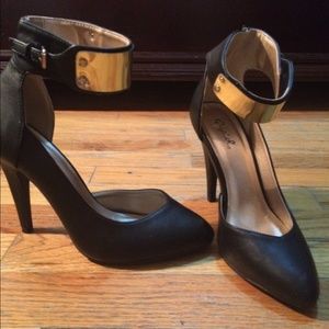 Black shoes. With gold plate