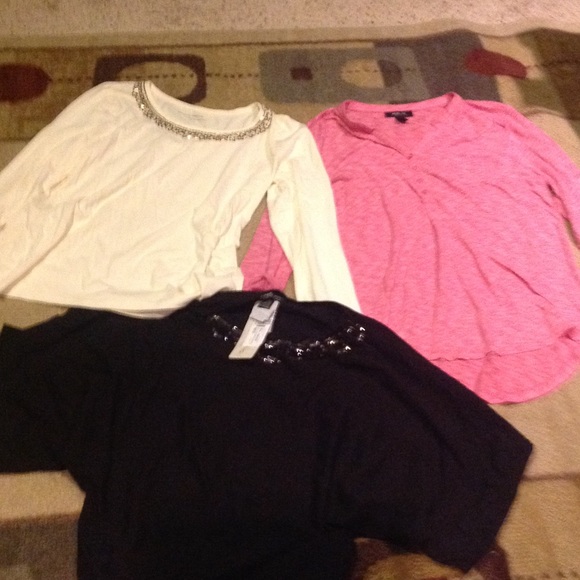 3 brand-new tops with tags off of the price of one
