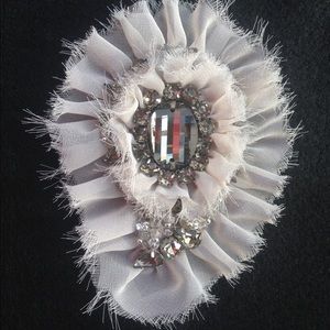 CAbi brooch in silver rhinestones.