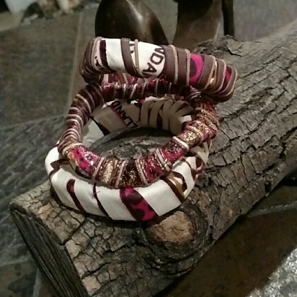 A set of 3 bangles with leather strips!!!