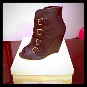 Open toe buckled wedge booties!