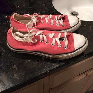 Coral low top converse.