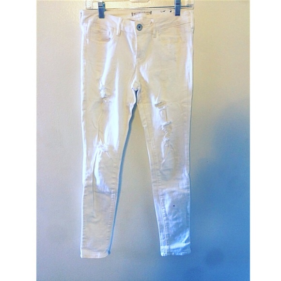 Distressed white denim skinny jean