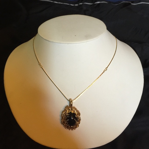 Vintage black cabochon and gold detailed pendant