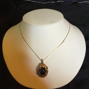 Vintage black cabochon and gold detailed pendant