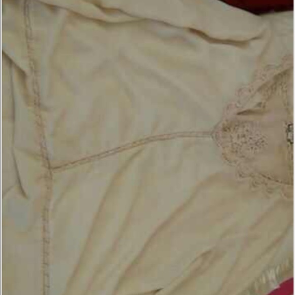 Cream long sleeve shirt