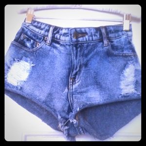 Shredded denim short shorts.