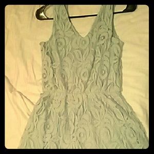 Light teal color very pretty about knee length