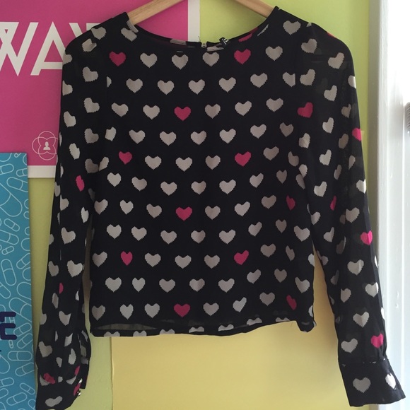 Black top with patterned hearts
