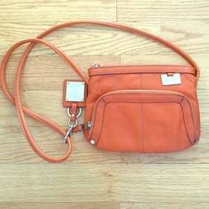 Tiganello cross body. Genuine leather. Never used.