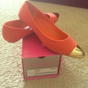 Orange flat with gold cap toe