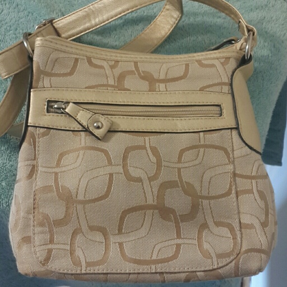 Golden beige crossbody  bag.