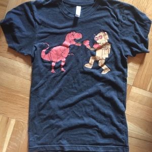AA robot fighting dino tee