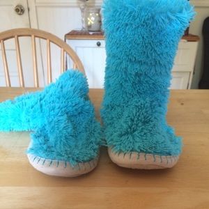 Blue fuzzy slippers