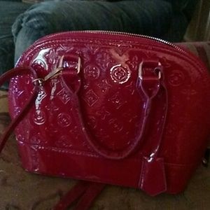 Red vinyl handbag designer inspired