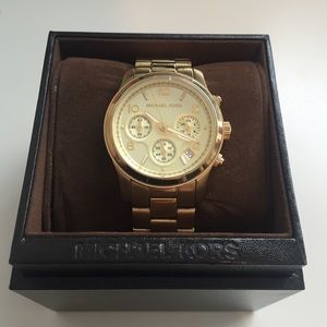 Michael Kors multifunction gold women's watch
