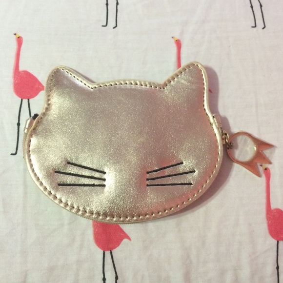Cooperative gold kitty wallet.