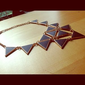 Black leather and gold triangle statement necklace
