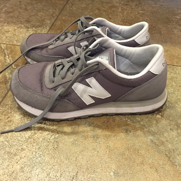 501 New Balance grey tennis shoes