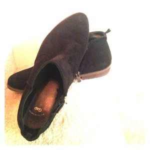 Deep black ankle boots.