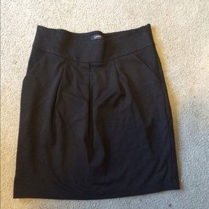 Pleated black skirt with side pockets final