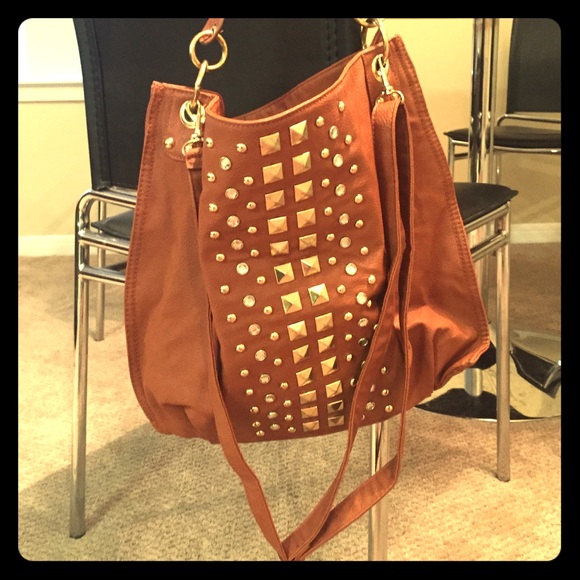 Brown and gold studded purse