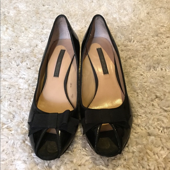 Black peeptoe pumps