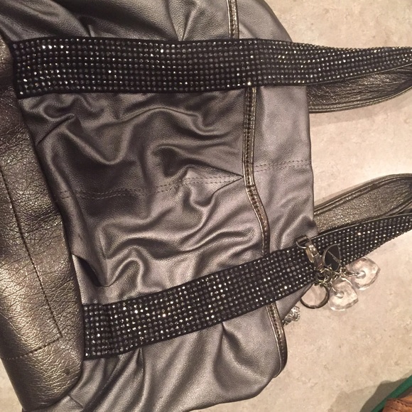 Purse, grey with Bling an charms! Good condition.