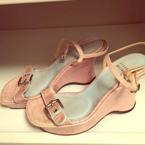 Stuart Weitzman wedge embossed leather sandals.