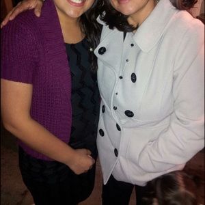 A cute purplish cardigan sweater, short sleeve