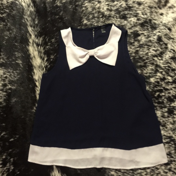 Navy top with white bow detail