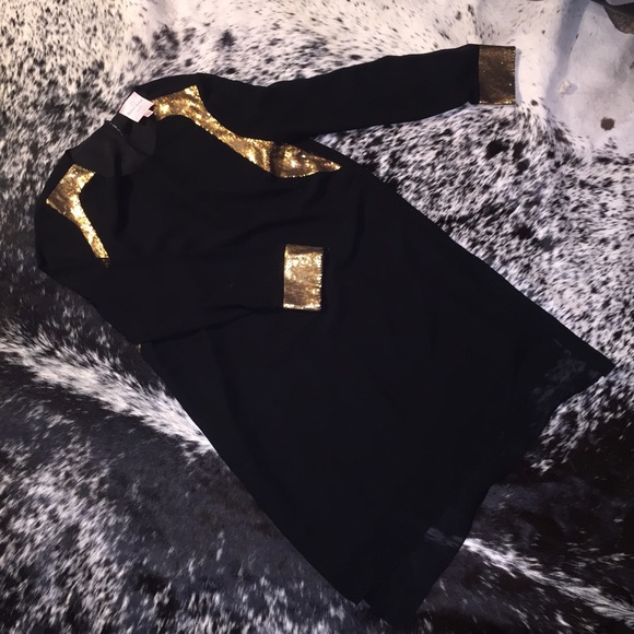 Black dress with gold detail