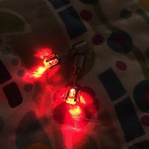 Red LED earrings. Raves. Festivals