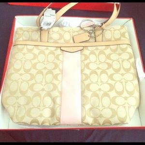Brand new Coach tote. Tan with pink leather trim.